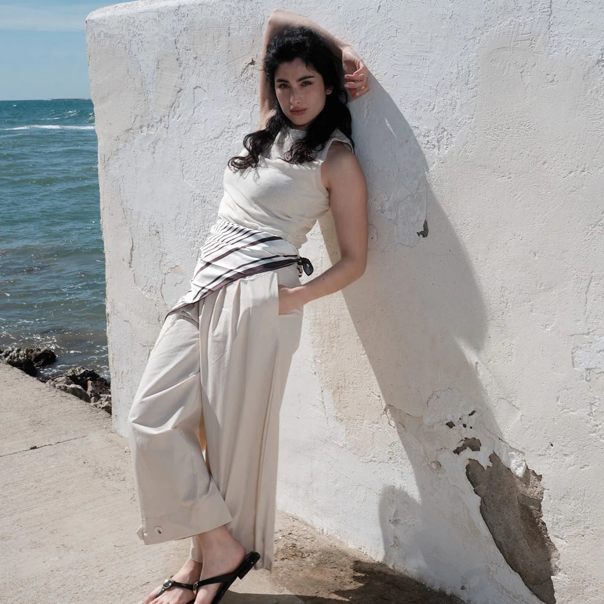 Textured_Leather_ToeRing_Sandal_with_Metallic_Detail_From_Spanish_footwear_brand_Angel_Alarcon.webp
